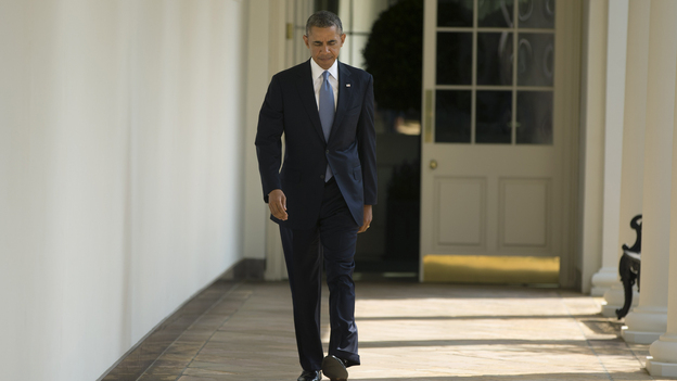 President Obama walks toward the Oval Office of the White House on Tuesday. (AP)