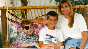 Hayden Strum (left) with his older brother, Gunnar, and their mom, Kathleen, in 1998.