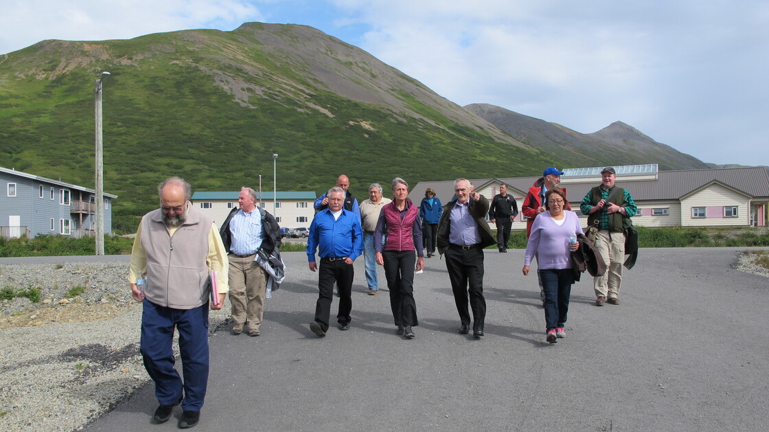 Interior Secretary Sally Jewell (center) gets a tour of King Cove, Alaska.