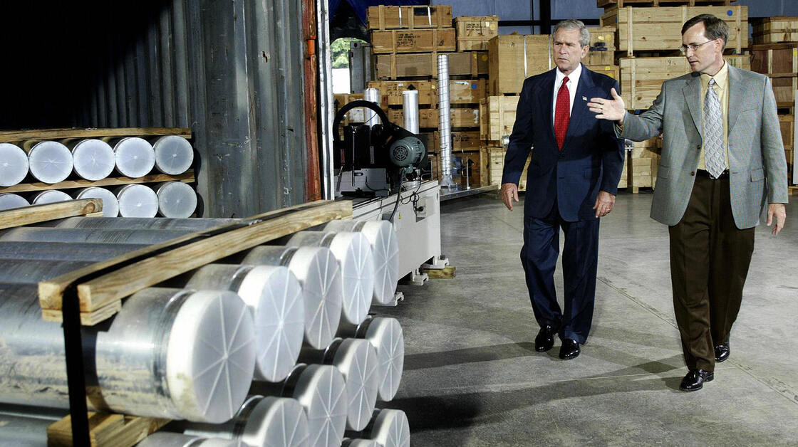 President George W. Bush receives a tour of nuclear material surrendered by Libya and flown to the Oak Ridge National Laboratory, a U.S. facility in Oak Ridge, Tenn., on July 12, 2004.