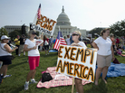Linda Norman (right) and Joanna Galt, both from Florida, hold their banners during a rally against the health care law Tuesday outside the U.S. Capitol. Linda Norman (right) and Joanna Galt, both from Florida, hold their banners during a rally against the health care law Tuesday outside the U.S. Capitol.