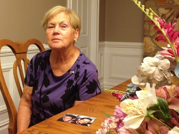 Sandra Grazioso sits at a New Jersey funeral home, where she will receive the newly identified shoulder and tooth of her son, Tim. Both of her sons died in the terrorist attacks. (Image credit: WNYC)