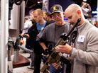 George Sherer and his son, Jeff, look at a SIG Sauer 716 patrol rifle during the NRA Annual Meetings and Exhibits last April in St. Louis. George Sherer and his son, Jeff, look at a SIG Sauer 716 patrol rifle during the NRA Annual Meetings and Exhibits last April in St. Louis.