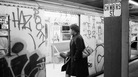 A passenger boards a subway car painted with graffiti, in New York in 1984. A passenger boards a subway car painted with graffiti, in New York in 1984.
