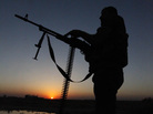 A Free Syrian Army fighter in eastern Syria on Wednesday. A Free Syrian Army fighter in eastern Syria on Wednesday.