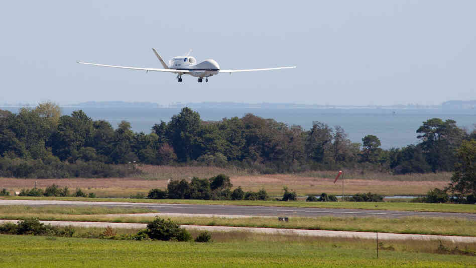 A Global Hawk unmanned aircraft comes in for a landing at the Wallops Flight Facility in Wallops Island, Va., on Sept. 7, 2012, after studying Hurricane Leslie. The remotely controlled planes can stay in the air for as long as 28 hours and fly over hurricanes at altitudes of more than 60,000 feet. A Global Hawk unmanned aircraft comes in for a landing at the Wallops Flight Facility in Wallops Island, Va., on Sept. 7, 2012, after studying Hurricane Leslie. The remotely controlled planes can stay in the air for as long as 28 hours and fly over hurricanes at altitudes of more than 60,000 feet.
