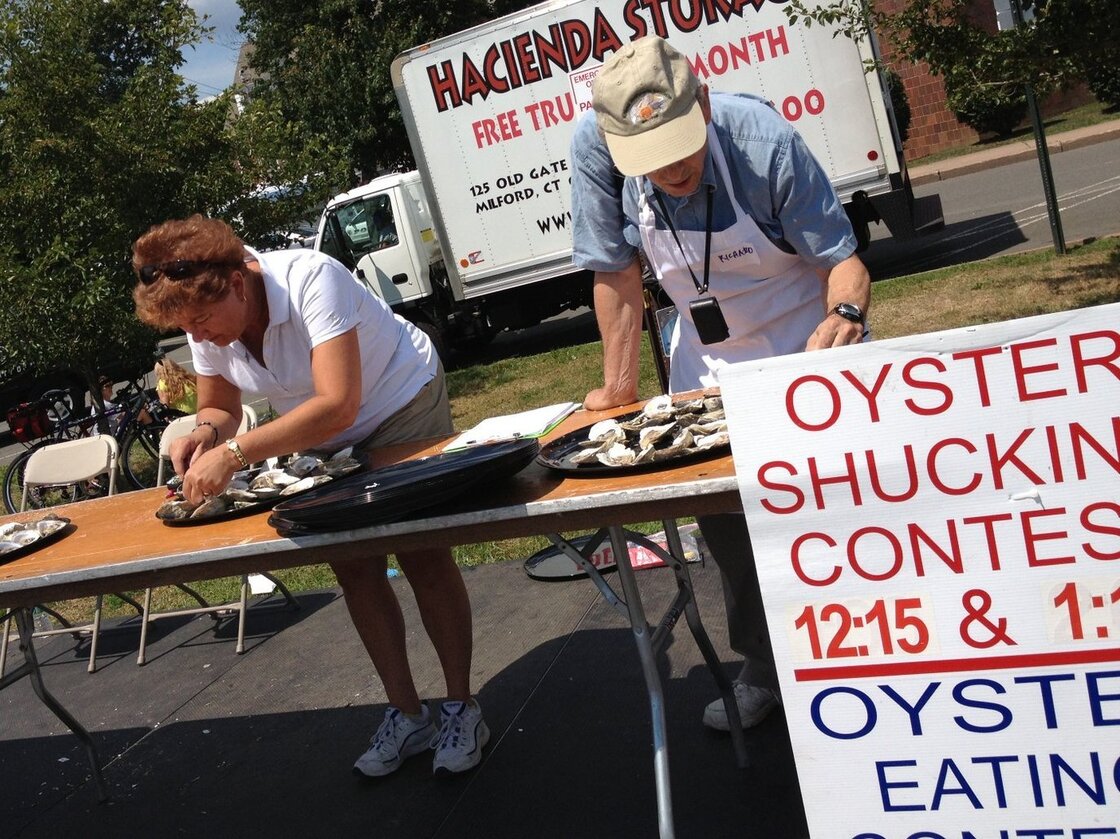 Connecticut's health exchange sent outreach workers to the Milford Oyster Festival to get people to sign up for health insurance.