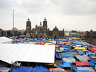General view of the Zocalo of Mexico City, on September 2, 2013, while thousands of teachers camp in protest against the new education law passed by the Congress. General view of the Zocalo of Mexico City, on September 2, 2013, while thousands of teachers camp in protest against the new education law passed by the Congress.
