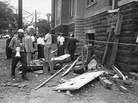 Investigators work outside the 16th Street Baptist Church in Birmingham, Ala., following an explosion that killed four young girls. Three Ku Klux Klansmen were convicted in the bombing years later. Investigators work outside the 16th Street Baptist Church in Birmingham, Ala., following an explosion that killed four young girls. Three Ku Klux Klansmen were convicted in the bombing years later.