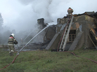 In a photo released by Russian officials in Novgorod, firefighters work at the site of a fire at a psychiatric hospital in the village of Luka on Friday. In a photo released by Russian officials in Novgorod, firefighters work at the site of a fire at a psychiatric hospital in the village of Luka on Friday.