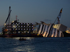 Work at the wreckage of the Costa Concordia continues through the night Sept. 14, off the Italian island of Giglio. The Costa Concordia is due to be righted, in a project set to begin Monday. Work at the wreckage of the Costa Concordia continues through the night Sept. 14, off the Italian island of Giglio. The Costa Concordia is due to be righted, in a project set to begin Monday.