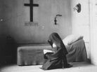 A Carmelite nun in her cell in France in 1904. A Carmelite nun in her cell in France in 1904.