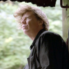Sonic Youth's Thurston Moore gazes over the rail on the Station to Station train as it speeds across the country. Sonic Youth's Thurston Moore gazes over the rail on the Station to Station train as it speeds across the country.