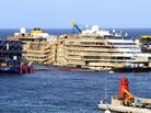 The wrecked cruise ship Costa Concordia, now back in an upright position. The wrecked cruise ship Costa Concordia, now back in an upright position.