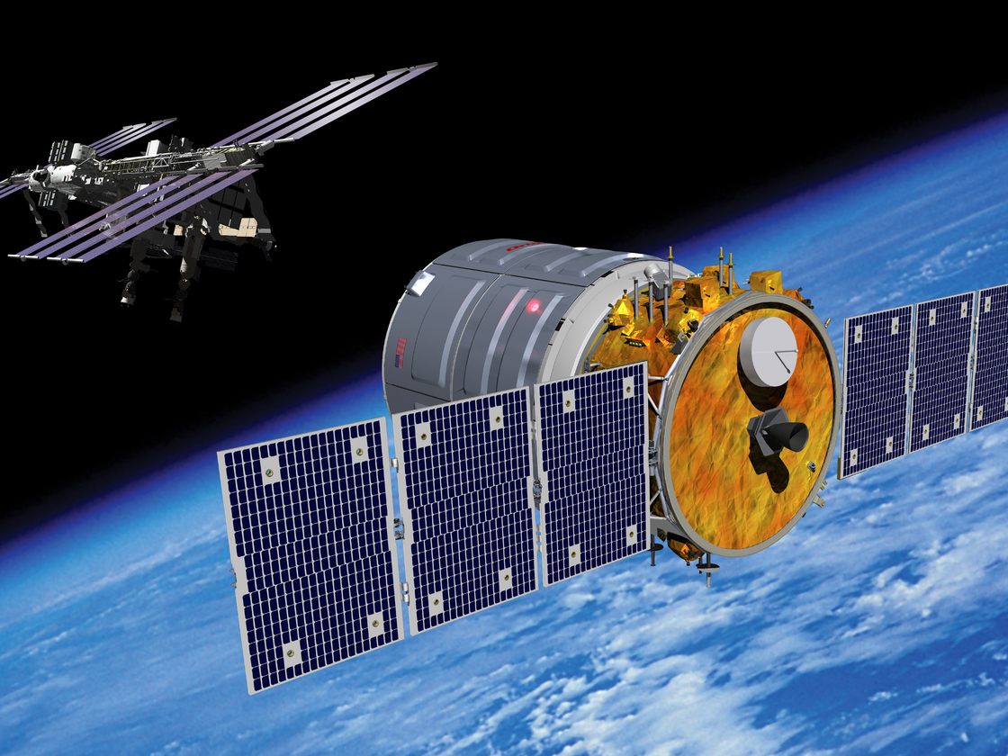 An artist's rendering of the Cygnus spacecraft approaching the International Space Station.