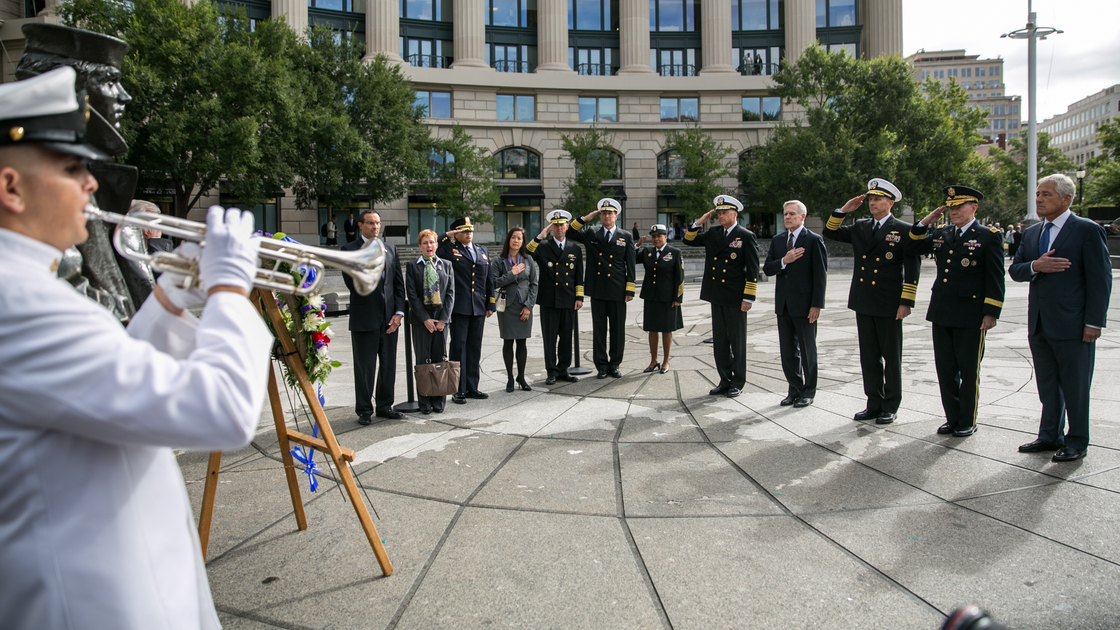 One day after 12 people and an alleged gunman died at the Navy Yard in Washington, D.C., details about their livse are beginning to emerge. Tuesday morning, Secretary of Defense Chuck Hagel, far right, and others laid a wreath at the U.S. Navy Memorial in honor of the shooting victims.
