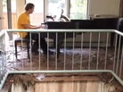 Mark Changaris sits at his piano, after a mudslide wrecked his home. Mark Changaris sits at his piano, after a mudslide wrecked his home.