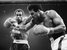 Muhammad Ali, right, winces as Ken Norton hits him with a left to the head in their scheduled 12-round re-match, Sept. 10, 1973 at the Forum in Inglewood, California. Muhammad Ali, right, winces as Ken Norton hits him with a left to the head in their scheduled 12-round re-match, Sept. 10, 1973 at the Forum in Inglewood, California.