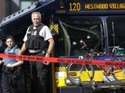 Police officials stand next to a bullet-ridden Seattle Metro bus on Aug. 12. A man with a history of mental illness shot and wounded the driver, then died in a chaotic shootout with police. Police officials stand next to a bullet-ridden Seattle Metro bus on Aug. 12. A man with a history of mental illness shot and wounded the driver, then died in a chaotic shootout with police.