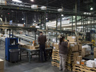 Workers prepare orders to be loaded for shipment at a UPS Healthcare Supply Chain and Distribution Center in Atlanta on March 12. The company recently announced that it would no longer offer coverage for spouses who had their own job-based insurance. Workers prepare orders to be loaded for shipment at a UPS Healthcare Supply Chain and Distribution Center in Atlanta on March 12. The company recently announced that it would no longer offer coverage for spouses who had their own job-based insurance.