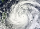 In this NASA image released Thursday, Typhoon Usagi is seen nearing Taiwan and the Philippines. In this NASA image released Thursday, Typhoon Usagi is seen nearing Taiwan and the Philippines.