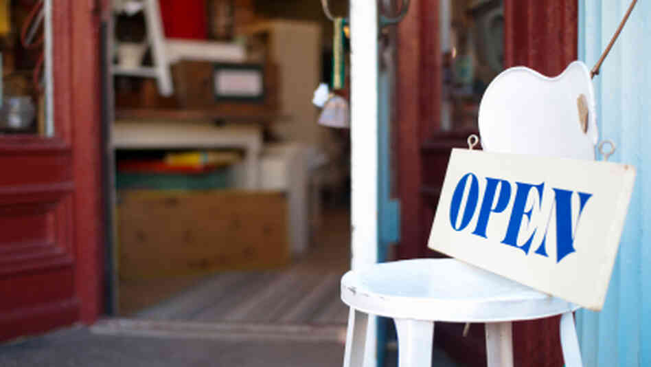 A small store's open-for-business sign A small store's open-for-business sign