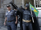 An anti-government demonstrator dressed as Batman carries a Brazilian flag at a protest during Brazil's Independence Day celebrations in Rio de Janeiro earlier this month. The protesters called on the government to provide better security, education, health and public services. An anti-government demonstrator dressed as Batman carries a Brazilian flag at a protest during Brazil's Independence Day celebrations in Rio de Janeiro earlier this month. The protesters called on the government to provide better security, education, health and public services.