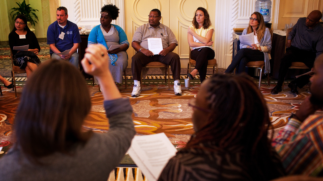 Assisters get up to speed on how best to explain the new health coverage choices during training on Sept. 25 at the Omni Shoreham Hotel in Washington, D.C.