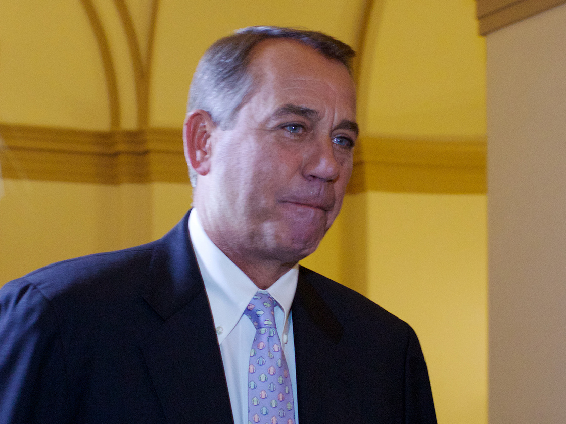 House Speaker John Boehner of Ohio arrives at the U.S. Capitol Saturday. He scheduled a closed-door meeting with Republican lawmakers over legislation to fund the federal government past Monday.