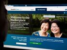 A woman looks at the HealthCare.gov insurance exchange site on Tuesday in Washington, D.C. A woman looks at the HealthCare.gov insurance exchange site on Tuesday in Washington, D.C.