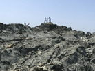 Pakistanis walk on an island that emerged off the coastline of the Arabian Sea following a deadly magnitude 7.7 earthquake in Pakistan's southern province of Baluchistan on Sept. 24. Pakistanis walk on an island that emerged off the coastline of the Arabian Sea following a deadly magnitude 7.7 earthquake in Pakistan's southern province of Baluchistan on Sept. 24.
