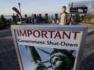 A sign announces the closing of the Statue of Liberty on Tuesday. A sign announces the closing of the Statue of Liberty on Tuesday.