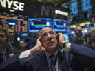 JPMorgan Chase trader Frederick Reimer works on the floor of the New York Stock Exchange. The government's monthly jobs numbers won't be released as scheduled Friday, leaving financial markets without key data to evaluate the economy. JPMorgan Chase trader Frederick Reimer works on the floor of the New York Stock Exchange. The government's monthly jobs numbers won't be released as scheduled Friday, leaving financial markets without key data to evaluate the economy.