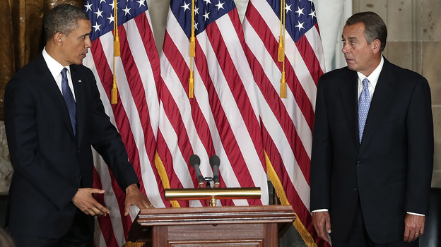 President Obama and House Speaker John Boehner take part in a ceremony to unveil a statue honoring the late civil rights activist Rosa Parks in the Capitol in February. (Image credit: Getty Images)