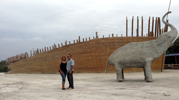 Carolina and Reniel Peralta of the Hidden Ark in March, before the county government made them tear down the ark. The ark was deconstructed in June, but the concrete elephant still stands. (Image credit: WLRN)