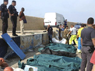 Some of the victims recovered after Thursday's wreck of a ship near Sicily were placed in body bags before being brought ashore to the island of Lampedusa. Some of the victims recovered after Thursday's wreck of a ship near Sicily were placed in body bags before being brought ashore to the island of Lampedusa.