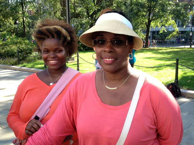 Sandy evacuees Shawn Little (right) and her daugher, Terri, joined a press conference to protest for more time at city hotels while they look for permanent homes. (Image credit: NPR)