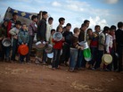 Syrian youths line up for food distribution in the Maiber al-Salam refugee camp in northern Syria, near the border with Turkey. The U.S. government has provided more than $1.5 billion in aid to Syrians since the uprising began in 2011. Syrian youths line up for food distribution in the Maiber al-Salam refugee camp in northern Syria, near the border with Turkey. The U.S. government has provided more than $1.5 billion in aid to Syrians since the uprising began in 2011.