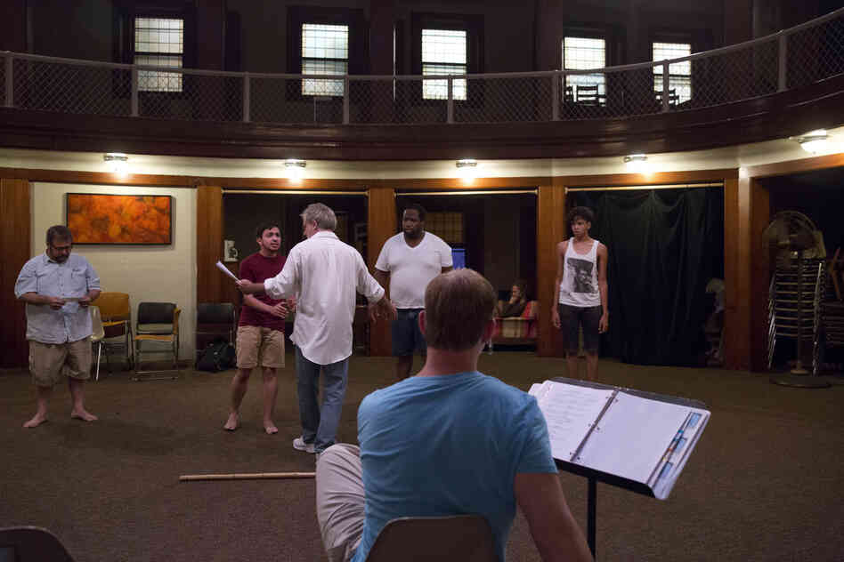 Younes rehearses a scene for The Tempest with his castmates at St. Mark's Evangelical Church in Baltimore.