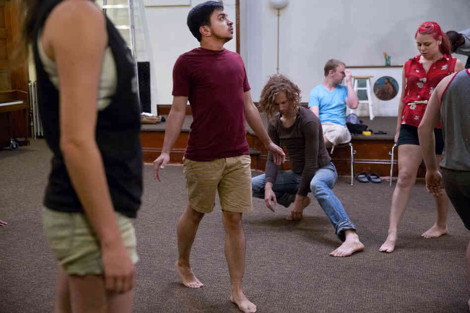Younes participates in theater rehearsal. Most of the people he interacts with know of his transition, but there are several people who he knows may not.