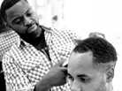 London barber Faisal Abdu'Allah cuts director Andy Mundy-Castle's hair. London barber Faisal Abdu'Allah cuts director Andy Mundy-Castle's hair.