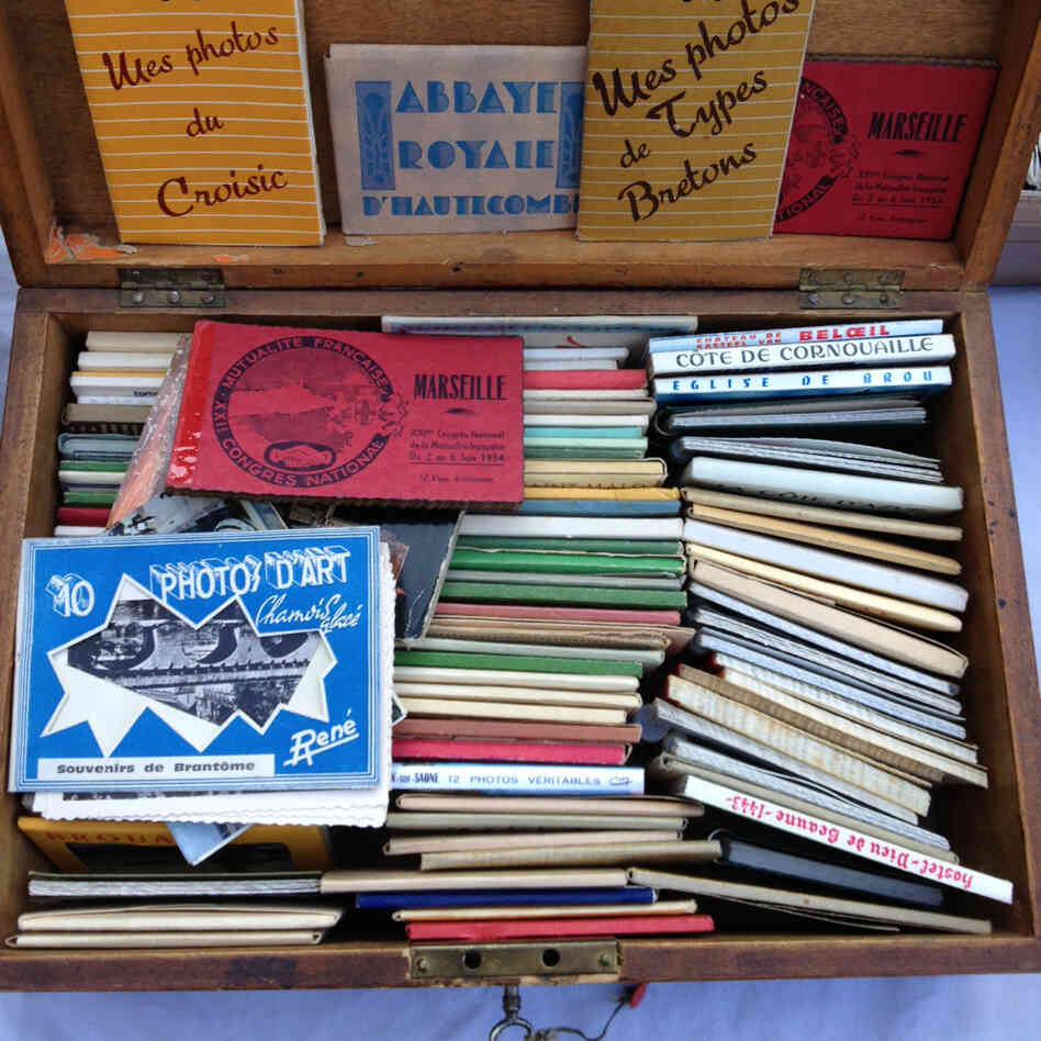 A box of souvenir photos at a Paris flea market A box of souvenir photos at a Paris flea market