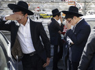 Followers of Rabbi Ovadia Yosef mourn outside his home in Jerusalem on Monday. The rabbi, who transformed his downtrodden community into a powerful force in Israeli politics, died at age 93. Followers of Rabbi Ovadia Yosef mourn outside his home in Jerusalem on Monday. The rabbi, who transformed his downtrodden community into a powerful force in Israeli politics, died at age 93.