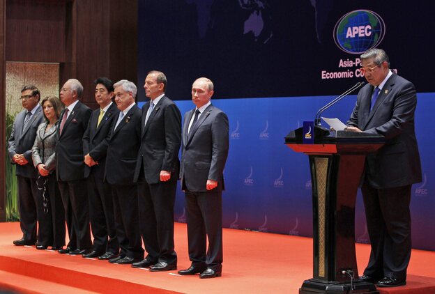 Indonesian President Susilo Bambang Yudhoyono speaks Tuesday at the Asia-Pacific Economic Cooperation summit on the Indonesian resort island of Bali. President Obama missed the meeting due to the budget impasse in Washington. (Image credit: EPA/Landov)