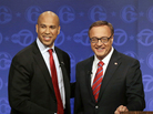 Democrat Cory Booker (left) and Republican Steve Lonegan stand together after their first debate in the race for U.S. Senate on Oct. 4 in Trenton, N.J. Democrat Cory Booker (left) and Republican Steve Lonegan stand together after their first debate in the race for U.S. Senate on Oct. 4 in Trenton, N.J.