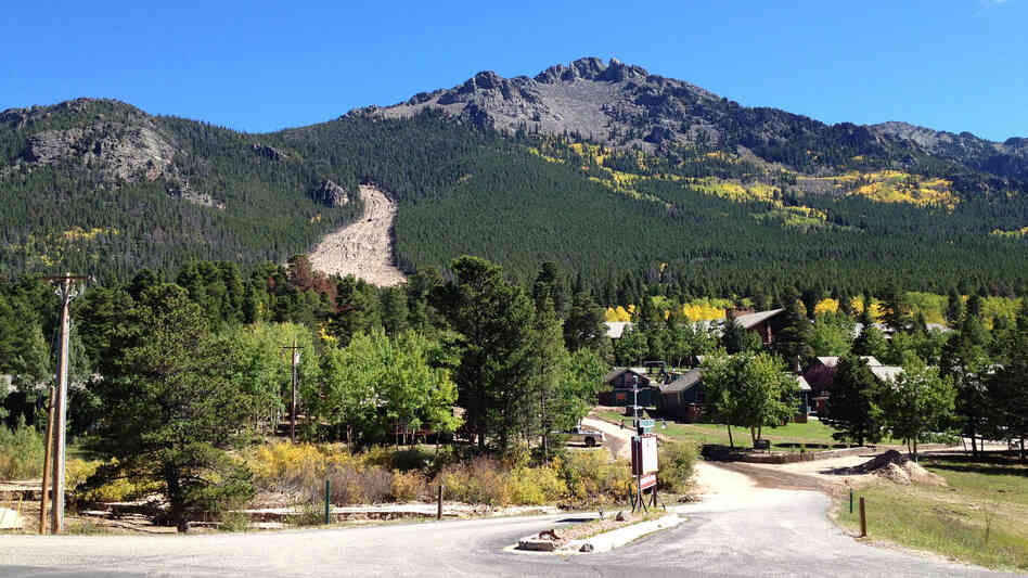 A massive landslide, left, in the Rockies, sent mud, rocks, boulders and trees barreling down the slopes. A massive landslide, left, in the Rockies, sent mud, rocks, boulders and trees barreling down the slopes.