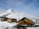 The Chalet (right) is the U.S. Antarctic Program's administrations and operations center at McMurdo Station. The Chalet (right) is the U.S. Antarctic Program's administrations and operations center at McMurdo Station.