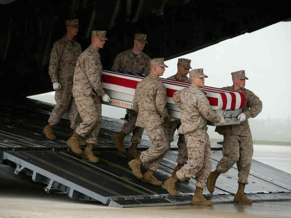 The remains of a U.S. soldier killed in Afghanistan in May arrive at Dover Air Force Base in Delaware. In Breach of Trust, writer and veteran Andrew Bacevich asks whether we the people are sufficiently connected to those who fight our wars — and die in them. The remains of a U.S. soldier killed in Afghanistan in May arrive at Dover Air Force Base in Delaware. In Breach of Trust, writer and veteran Andrew Bacevich asks whether we the people are sufficiently connected to those who fight our wars — and die in them.