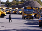 School buses sit idle in a lot at Veolia Transportation, Boston's school bus contractor, on Tuesday School buses sit idle in a lot at Veolia Transportation, Boston's school bus contractor, on Tuesday