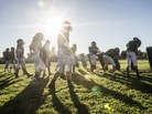 Football practice at Castro Valley High School in California. Proper hitting technique requires players to keep their heads up to prevent neck injuries and concussions. Football practice at Castro Valley High School in California. Proper hitting technique requires players to keep their heads up to prevent neck injuries and concussions.